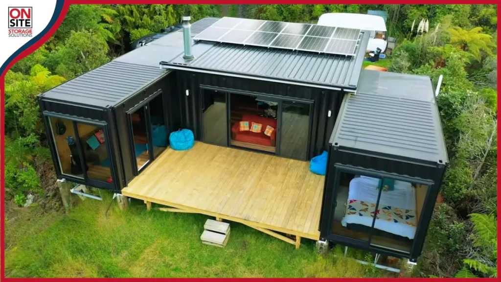 The River Forest Lookout in Epworth, Georgia, USA, is a unique structure made from two shipping containers, called "cabs," positioned 60 feet above the forest. This design highlights container architecture and provides stunning views, promoting sustainable living in nature.