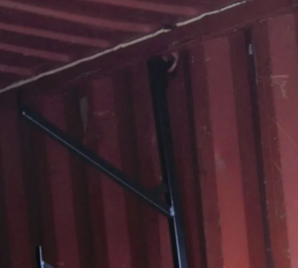 black_powder_coated_steel_shipping_container_4_tier_pipe_rack_18_l_x_64_h_sold_as_a_single_piece_action_shot_-_mytee_products_5