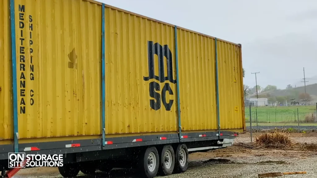 Proper site selection and drainage layout for a shipping container tornado shelter