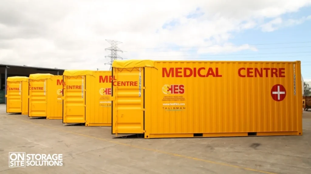 Shipping container storage solutions deployed in disaster zone for emergency supply storage.
